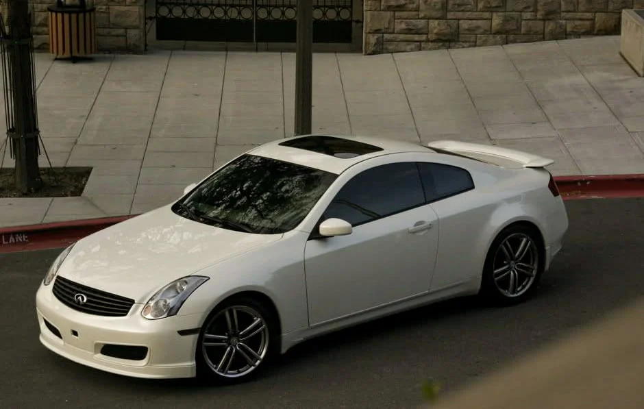 White G35 coupe lowered on coilovers
