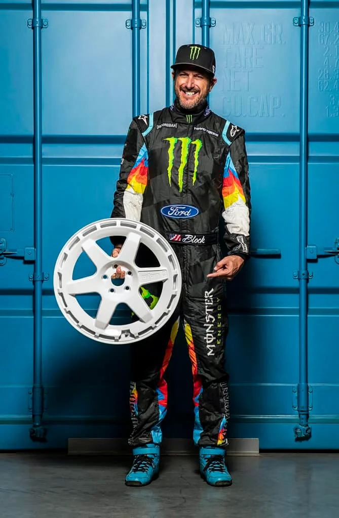 Ken Block holding a white Rotiform rim