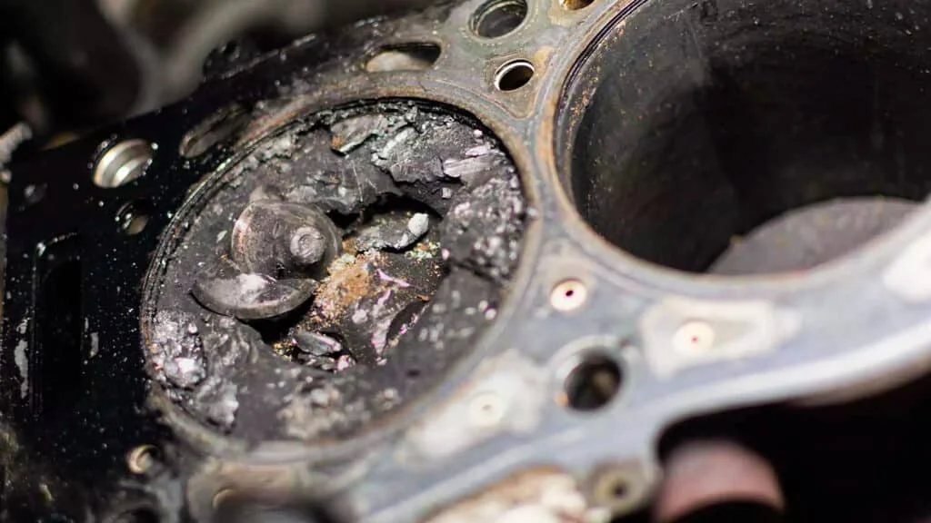 Piston damage due to interference