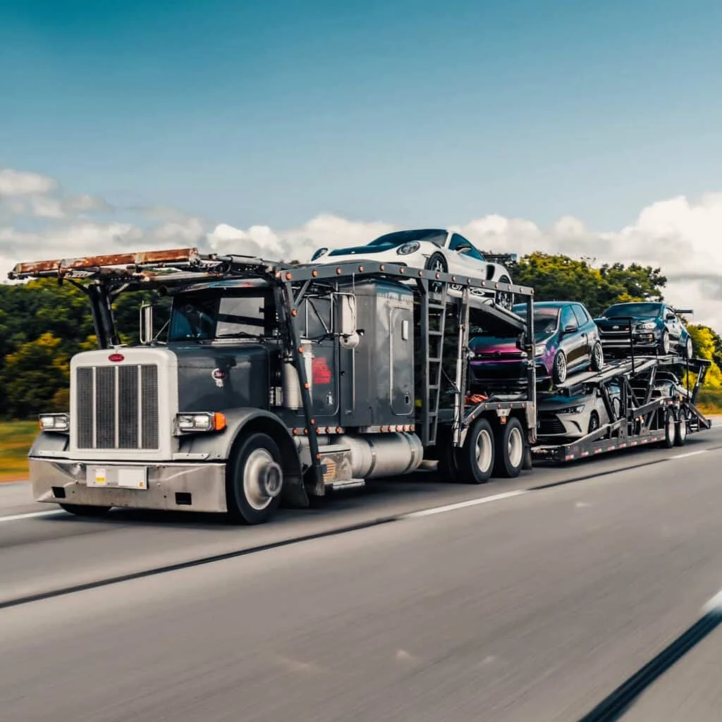 A truck transporting JDM cars