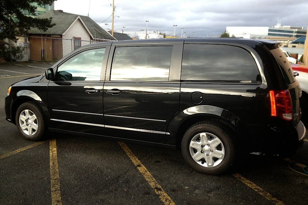 A black SUV with dark tint