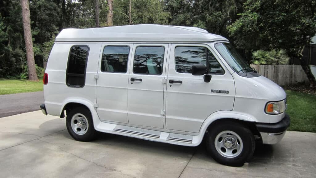 A white van with tinted widows
