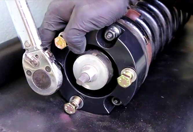 Installing a leveling kit on a factory strut