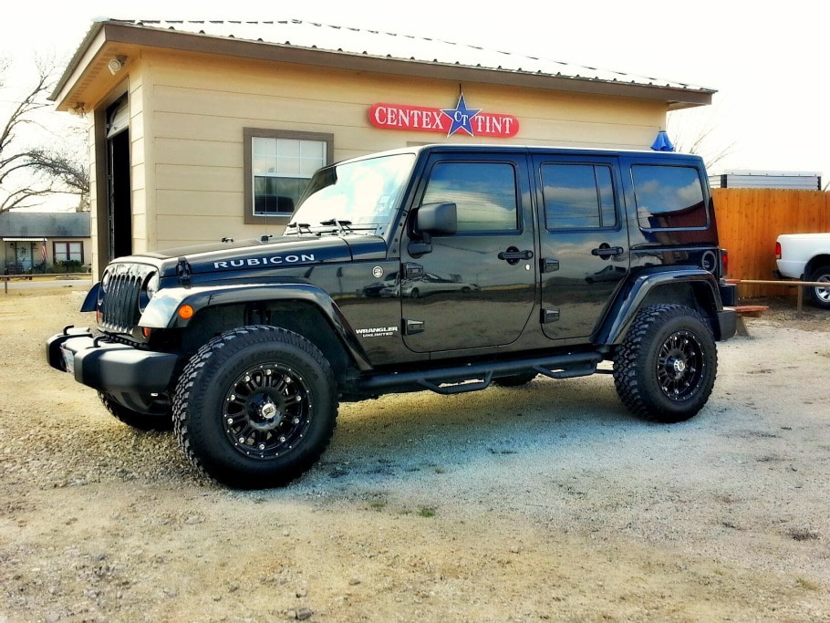 Black Jeep with reflective window tint