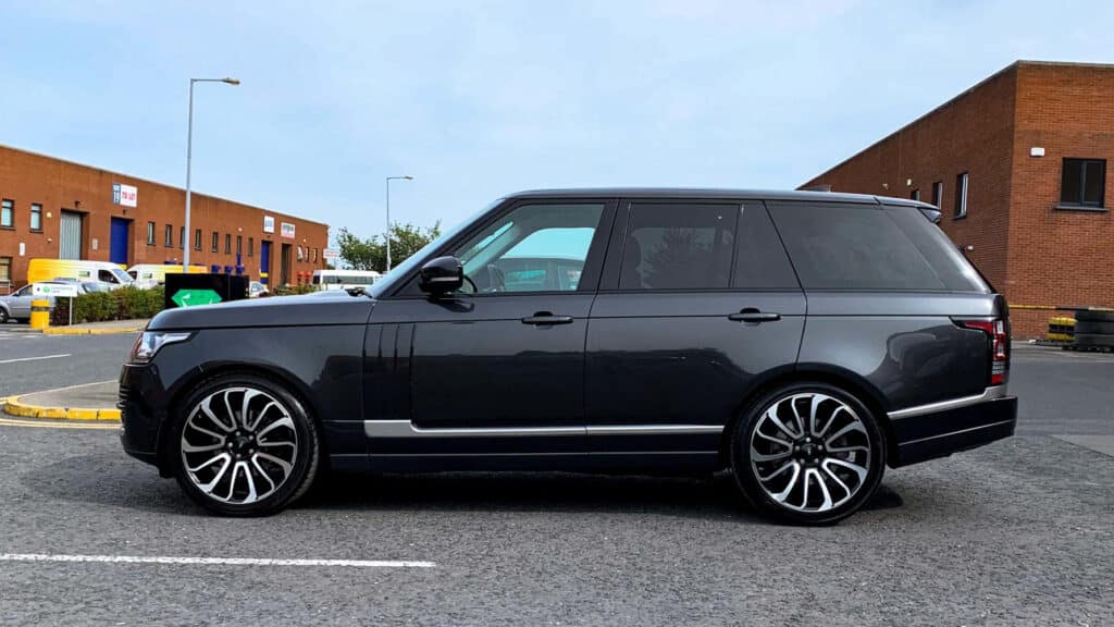 Black Range Rover with tinted windows