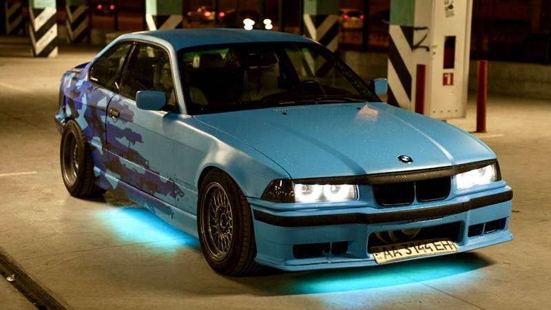 Teal underglow on a BMW coupe