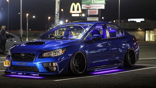 Subaru WRX with purple underglow