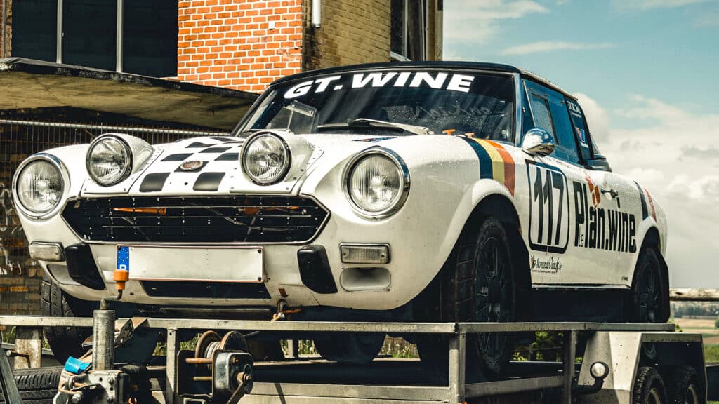 White Fiat Abarth 124 rally car