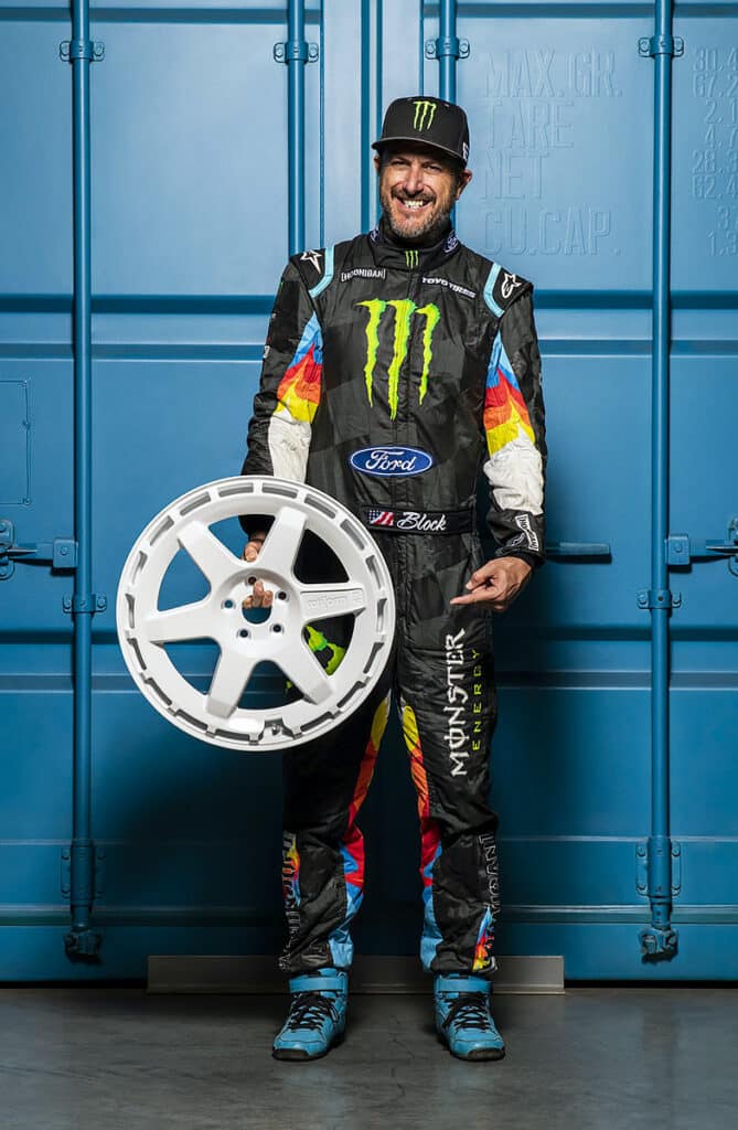 Ken Block holding a white Rotiform rim