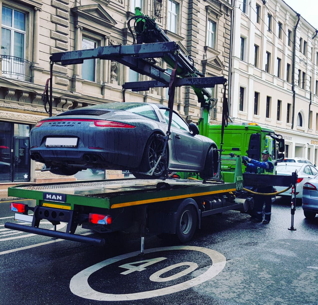 Porsche 911 GTS being towed