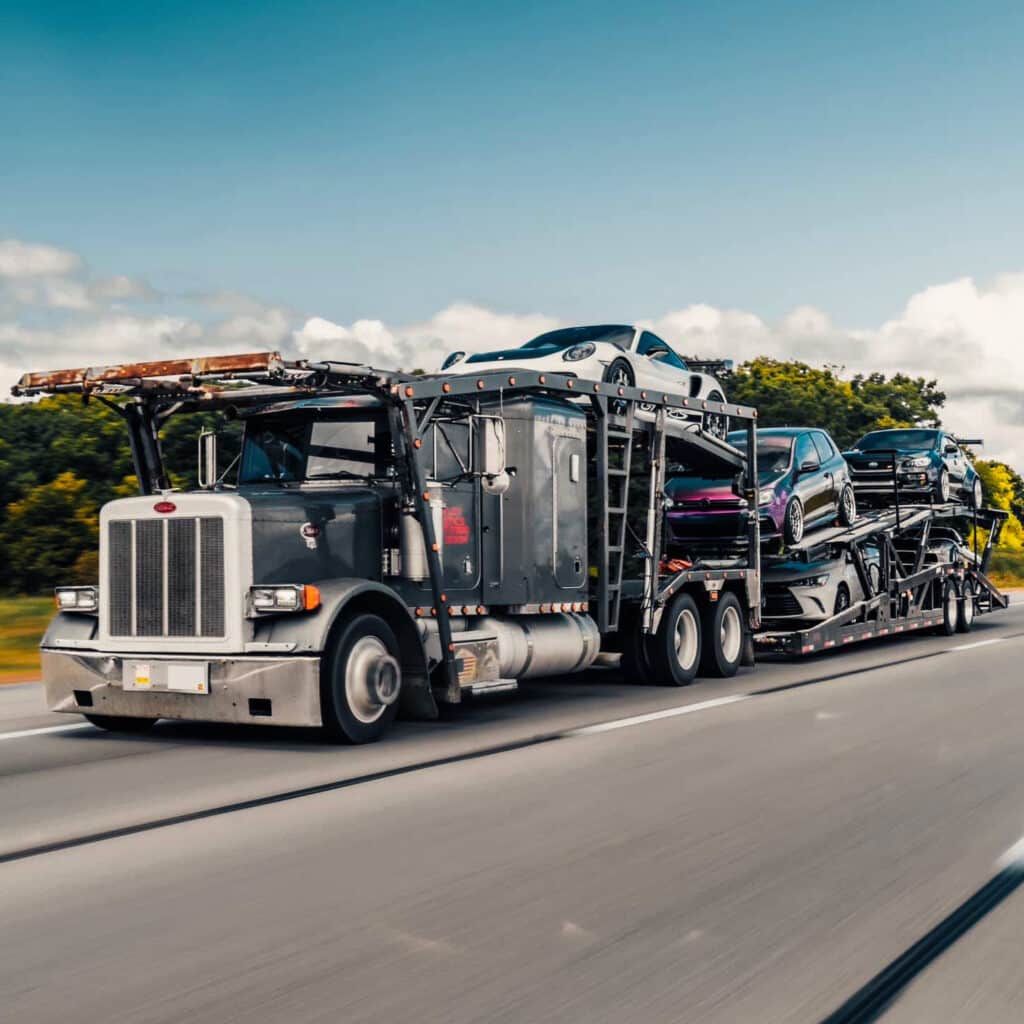 A truck transporting JDM cars